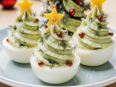 Stuffed eggs with guacamole shaped like Christmas trees